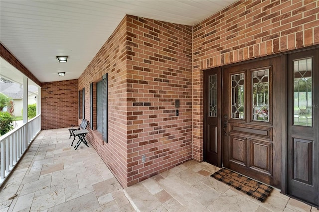 414 Summit Chase Dr, Valrico, FL 33594 - entrance to property with brick siding and a porch