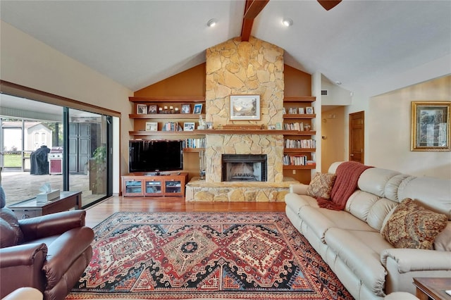 414 Summit Chase Dr, Valrico, FL 33594 - living room with wood finished floors, a fireplace, ceiling fan, and built in features