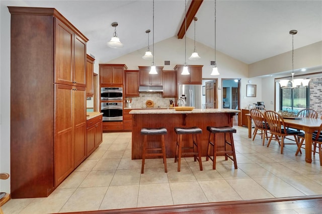 414 Summit Chase Dr, Valrico, FL 33594 - kitchen featuring under cabinet range hood, appliances with stainless steel finishes, beam ceiling, a chandelier, and tasteful backsplash