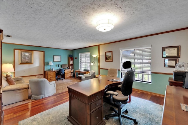 414 Summit Chase Dr, Valrico, FL 33594 - office space with wood finished floors, ornamental molding, healthy amount of natural light, a textured ceiling, and baseboards