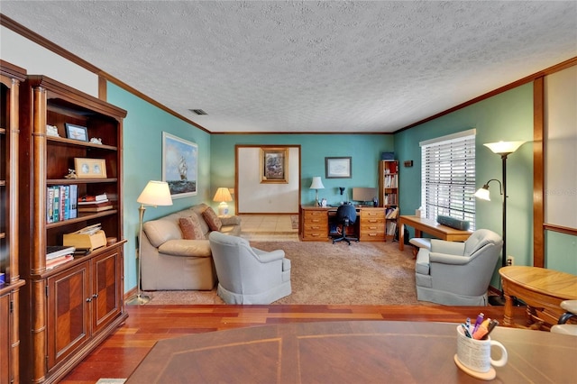 414 Summit Chase Dr, Valrico, FL 33594 - living area with crown molding, a desk, a textured ceiling, and wood finished floors