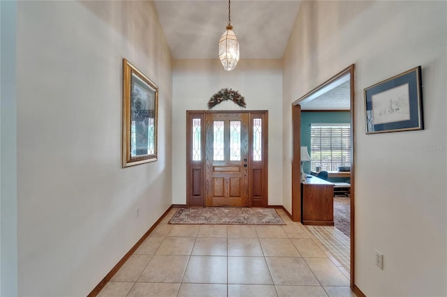 414 Summit Chase Dr, Valrico, FL 33594 - foyer with baseboards and light tile patterned floors