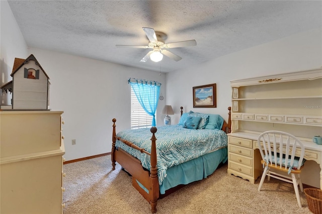 414 Summit Chase Dr, Valrico, FL 33594 - bedroom with light carpet, a textured ceiling, an office area, a ceiling fan, and baseboards