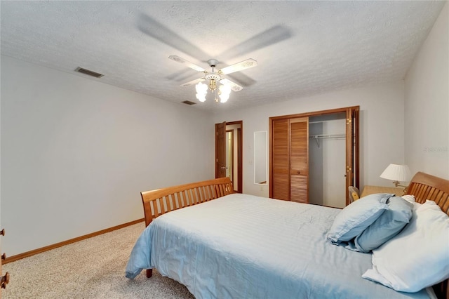 414 Summit Chase Dr, Valrico, FL 33594 - bedroom with a closet, carpet flooring, ceiling fan, a textured ceiling, and baseboards