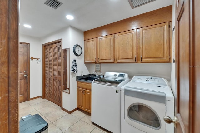 414 Summit Chase Dr, Valrico, FL 33594 - laundry room featuring washer and dryer, cabinet space, light tile patterned flooring, recessed lighting, and baseboards