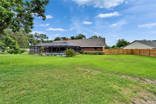 414 Summit Chase Dr, Valrico, FL 33594 - rear view of house with a lanai