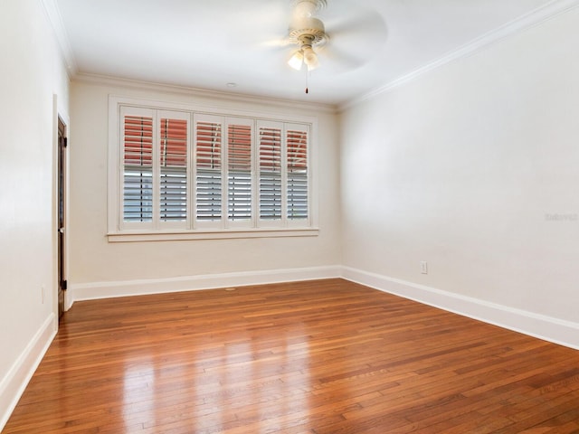 4521 W Azeele St, Tampa, FL 33609 - spare room featuring ceiling fan, wood-type flooring, ornamental molding, and baseboards