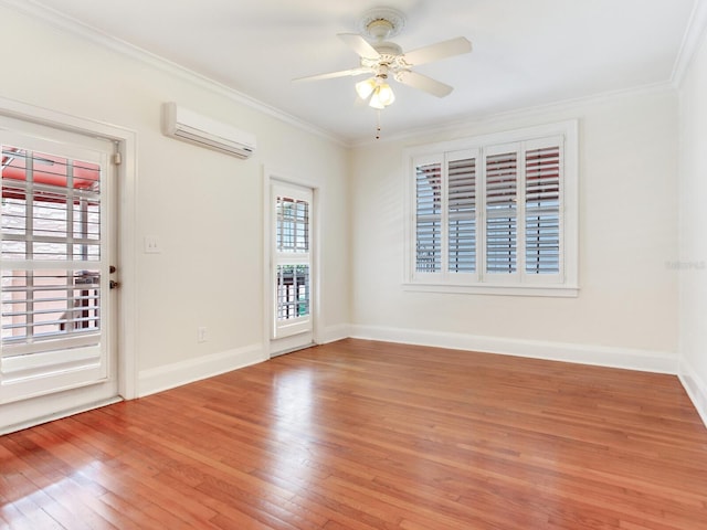 4521 W Azeele St, Tampa, FL 33609 - empty room with a wall unit AC, light wood-style flooring, crown molding, ceiling fan, and baseboards