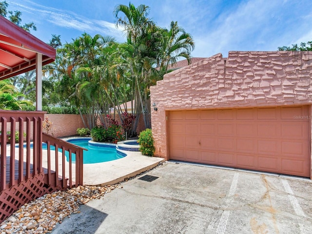 4521 W Azeele St, Tampa, FL 33609 - view of swimming pool with a pool with connected hot tub