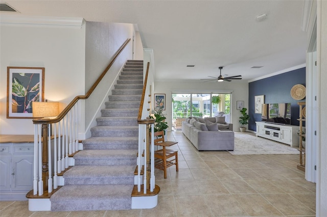 6468 Rubia Cir, Apollo Beach, FL 33572 - stairway with a ceiling fan and crown molding