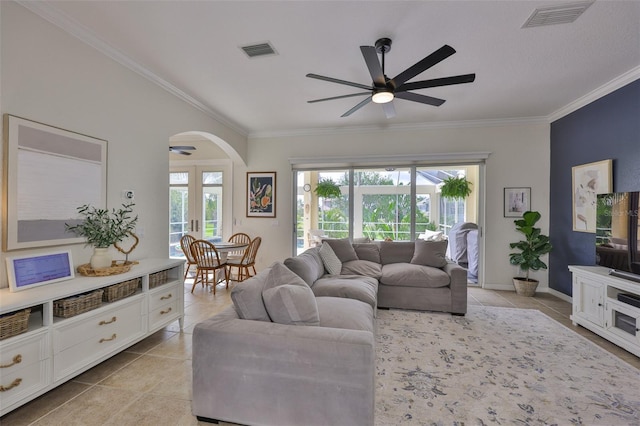 6468 Rubia Cir, Apollo Beach, FL 33572 - living area with ceiling fan, ornamental molding, light tile patterned floors, arched walkways, and baseboards