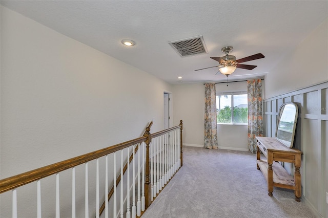 6468 Rubia Cir, Apollo Beach, FL 33572 - corridor with baseboards, light carpet, and an upstairs landing