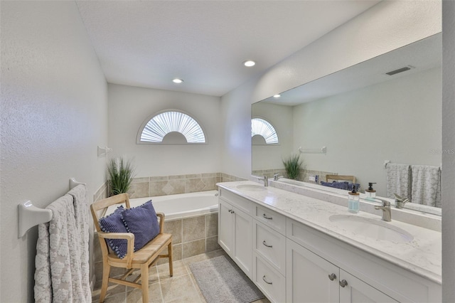 6468 Rubia Cir, Apollo Beach, FL 33572 - full bath with double vanity, a bath, tile patterned floors, and recessed lighting