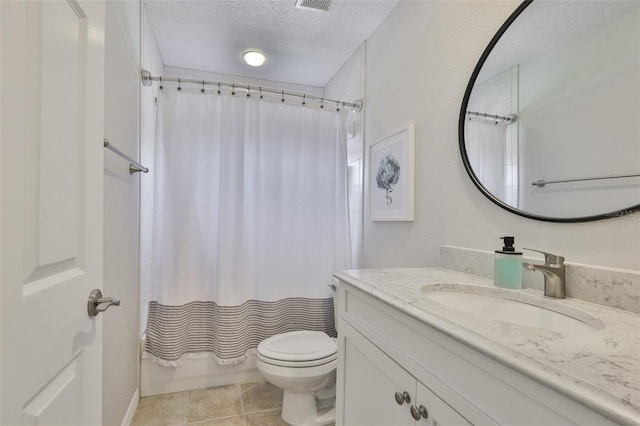 6468 Rubia Cir, Apollo Beach, FL 33572 - full bath featuring vanity, toilet, a textured ceiling, shower / tub combo, and tile patterned flooring
