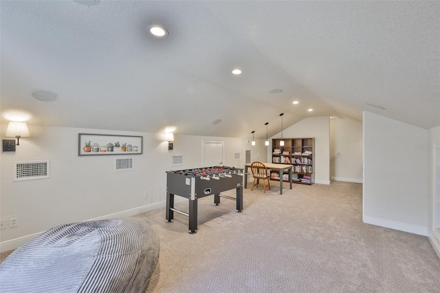 6468 Rubia Cir, Apollo Beach, FL 33572 - game room featuring vaulted ceiling, light carpet, baseboards, and a textured ceiling