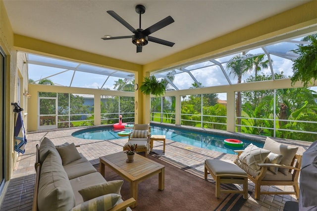 6468 Rubia Cir, Apollo Beach, FL 33572 - outdoor pool with glass enclosure, a patio area, a ceiling fan, and outdoor lounge area