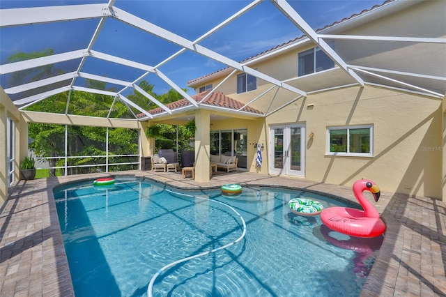 6468 Rubia Cir, Apollo Beach, FL 33572 - swimming pool featuring french doors, a patio, and a lanai