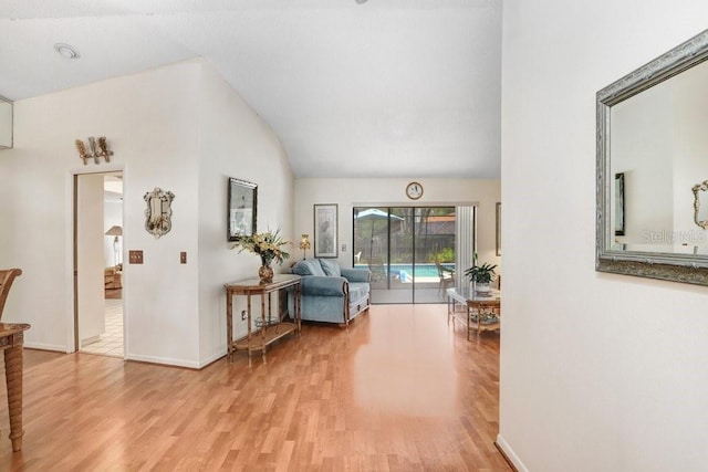 107 Halton Cir, Seffner, FL 33584 - hall featuring lofted ceiling, light wood-type flooring, and baseboards