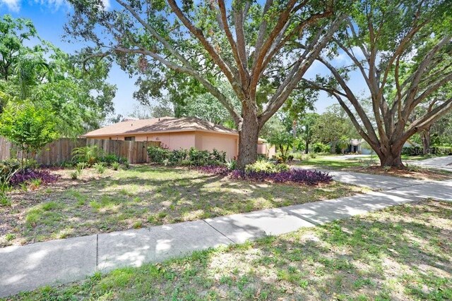 107 Halton Cir, Seffner, FL 33584 - view of front of house with an attached garage and concrete driveway
