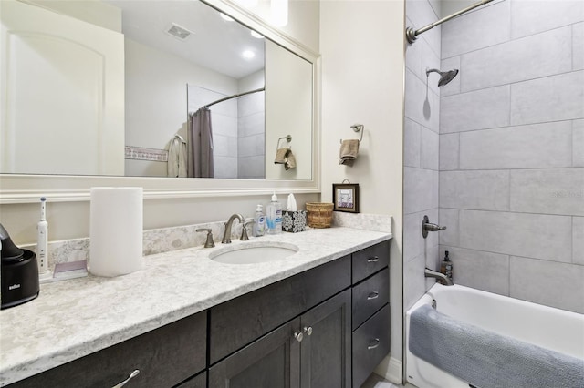 7991 Lake James Blvd, Lakeland, FL 33810 - full bathroom with vanity and shower / tub combo