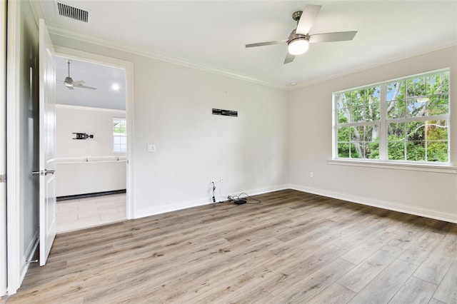 7991 Lake James Blvd, Lakeland, FL 33810 - spare room featuring ceiling fan, light wood-style flooring, ornamental molding, and baseboards