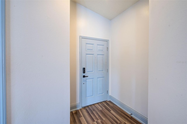 22943 Sills Loop, Land O Lakes, FL 34639 - entryway featuring dark wood-style floors and baseboards