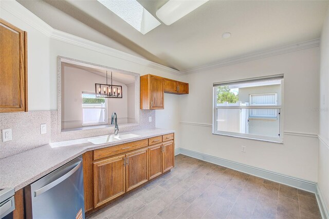 22943 Sills Loop, Land O Lakes, FL 34639 - kitchen with dishwasher, a sink, a skylight, brown cabinetry, and decorative backsplash