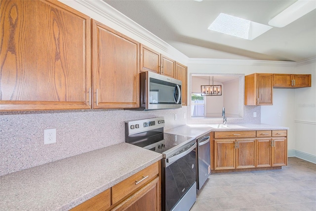 22943 Sills Loop, Land O Lakes, FL 34639 - kitchen with appliances with stainless steel finishes, a sink, tasteful backsplash, light countertops, and ornamental molding