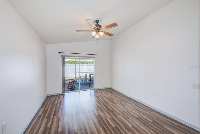 22943 Sills Loop, Land O Lakes, FL 34639 - empty room featuring vaulted ceiling, wood finished floors, ceiling fan, and baseboards