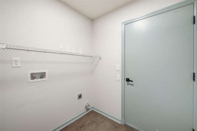 22943 Sills Loop, Land O Lakes, FL 34639 - laundry room featuring electric dryer hookup, baseboards, and washer hookup