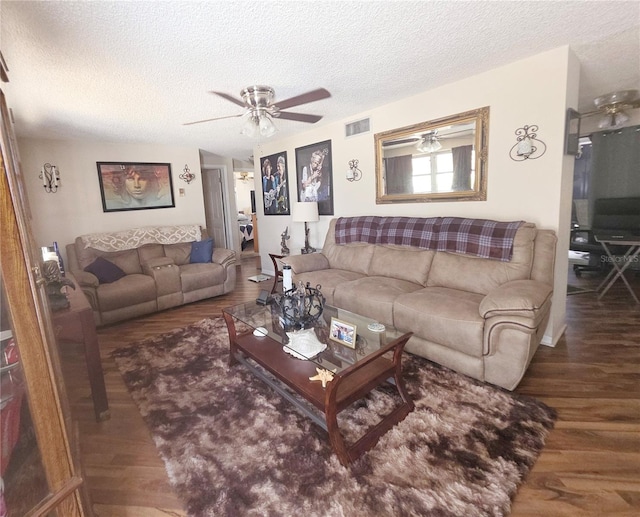 4902 Panorama Ave, Holiday, FL 34690 - living area featuring wood finished floors, a textured ceiling, and a ceiling fan