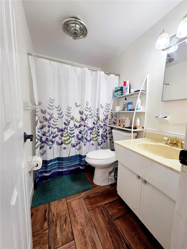 4902 Panorama Ave, Holiday, FL 34690 - bathroom with vanity, toilet, and a shower with curtain