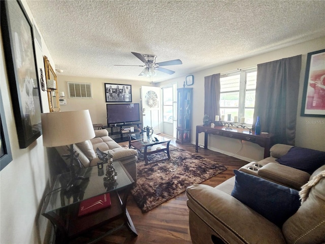 4902 Panorama Ave, Holiday, FL 34690 - living room with wood finished floors, a textured ceiling, and ceiling fan