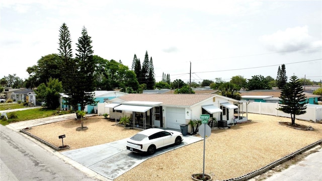 4902 Panorama Ave, Holiday, FL 34690 - ranch-style house with a garage and concrete driveway
