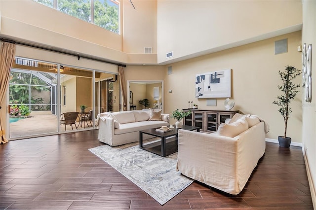 2354 Messenger Cir, Safety Harbor, FL 34695 - living room with wood finish floors, baseboards, and a high ceiling