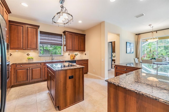 2354 Messenger Cir, Safety Harbor, FL 34695 - kitchen with a sink, a center island, healthy amount of natural light, decorative backsplash, and recessed lighting