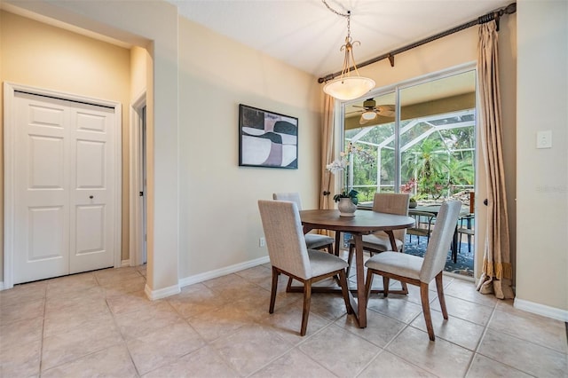 2354 Messenger Cir, Safety Harbor, FL 34695 - dining room with ceiling fan, baseboards, and light tile patterned floors