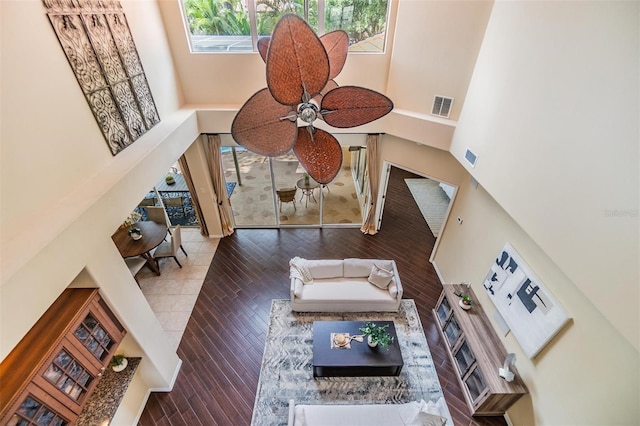 2354 Messenger Cir, Safety Harbor, FL 34695 - living area with a high ceiling, wood-type flooring, and ceiling fan