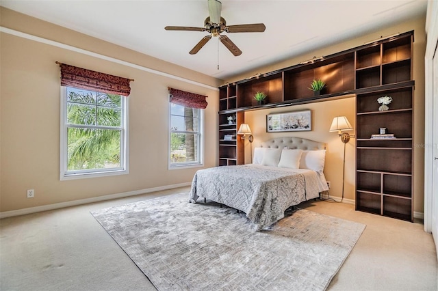 2354 Messenger Cir, Safety Harbor, FL 34695 - bedroom with carpet flooring, baseboards, and a ceiling fan