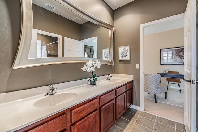 2354 Messenger Cir, Safety Harbor, FL 34695 - full bathroom featuring double vanity and tile patterned flooring