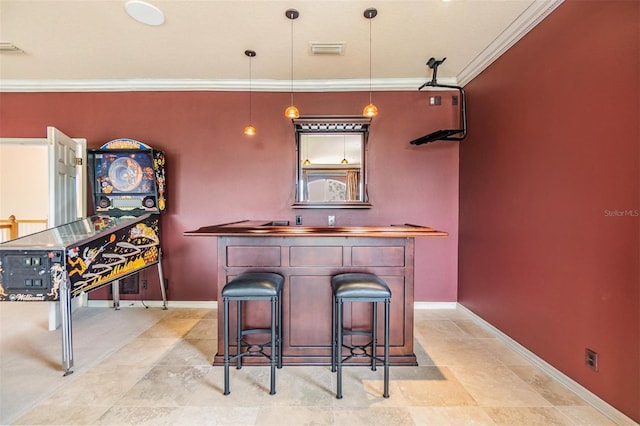 2354 Messenger Cir, Safety Harbor, FL 34695 - indoor dry bar featuring crown molding, baseboards, pendant lighting, and light tile patterned flooring