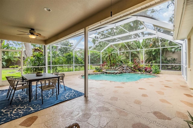 2354 Messenger Cir, Safety Harbor, FL 34695 - view of pool featuring a patio, a ceiling fan, a pool with connected hot tub, outdoor dining space, and a lanai