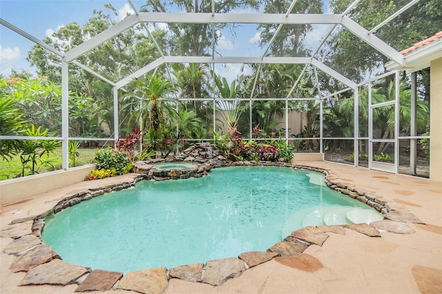 2354 Messenger Cir, Safety Harbor, FL 34695 - view of pool with a patio, glass enclosure, and a pool with connected hot tub