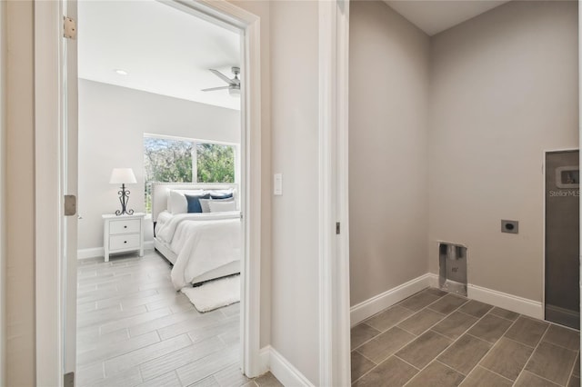 6433 Werner Ave, New Port Richey, FL 34652 - washroom with electric dryer hookup, ceiling fan, and baseboards