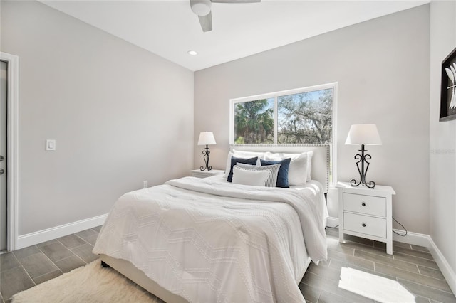 6433 Werner Ave, New Port Richey, FL 34652 - bedroom featuring wood tiled floors, baseboards, a ceiling fan, and recessed lighting