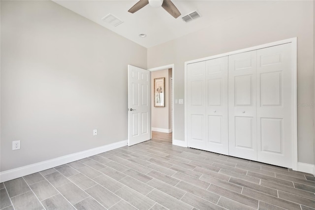 6433 Werner Ave, New Port Richey, FL 34652 - unfurnished bedroom with baseboards, light wood finished floors, a closet, and ceiling fan