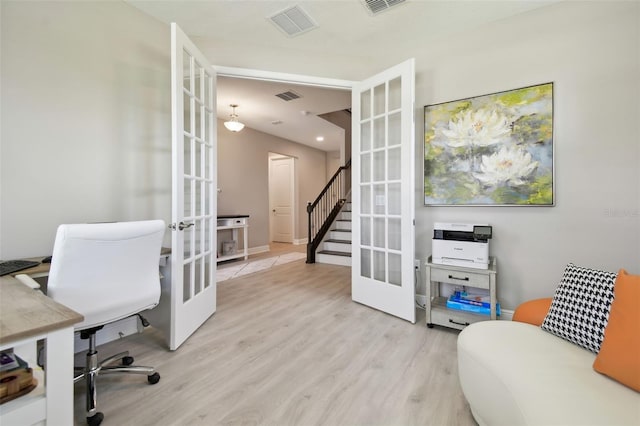 33287 Sycamore Leaf Dr, Wesley Chapel, FL 33545 - office area with french doors and wood finished floors
