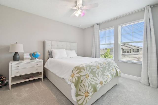 33287 Sycamore Leaf Dr, Wesley Chapel, FL 33545 - carpeted bedroom featuring baseboards and ceiling fan