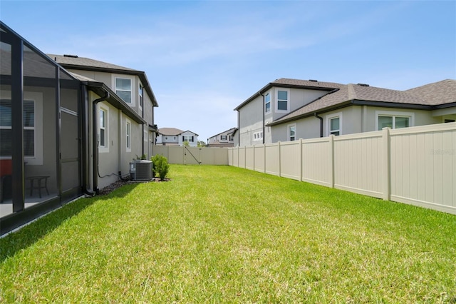 33287 Sycamore Leaf Dr, Wesley Chapel, FL 33545 - view of yard with central air condition unit and a residential view
