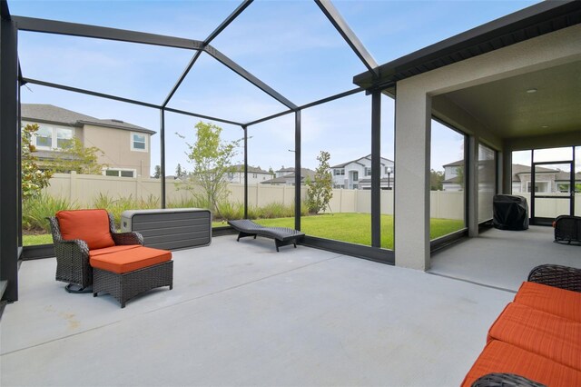 33287 Sycamore Leaf Dr, Wesley Chapel, FL 33545 - sunroom / solarium featuring a residential view